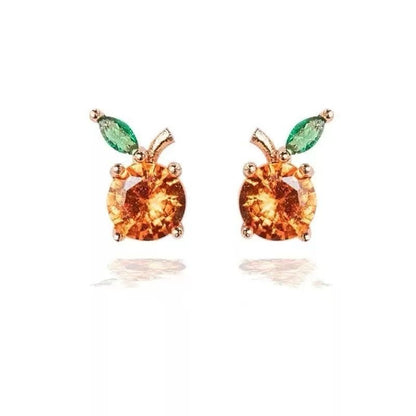 Mini fruit-shaped gold-filled stud earring on white background