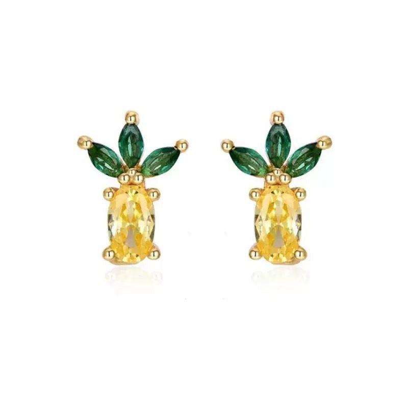 Mini fruit-shaped gold-filled stud earring on white background