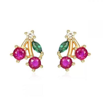 Mini fruit-shaped gold-filled stud earring on white background